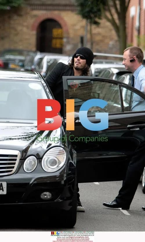 Russell Brand Seen Leaving Home with Lollipop