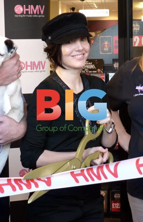 Sharleen Spiteri of Texas signs autographs at HMV Store opening
