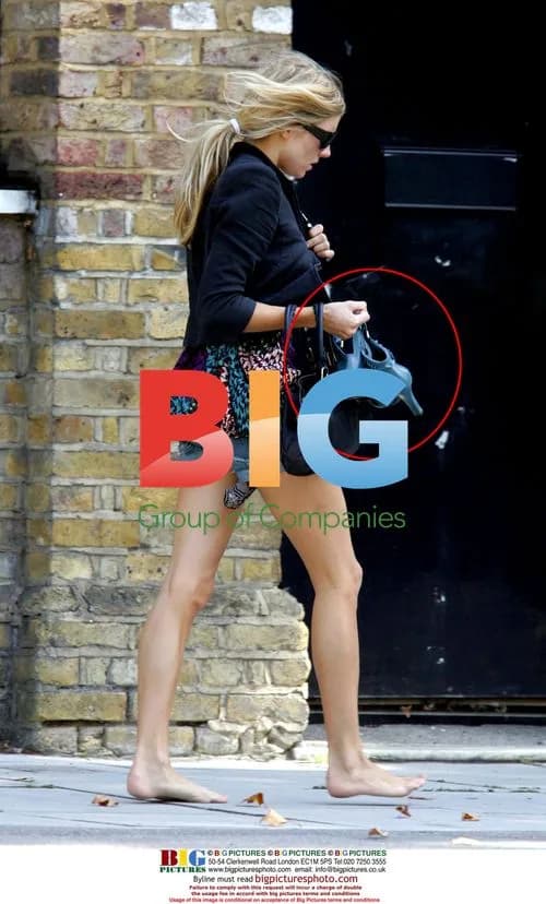 Sienna Miller walks home barefoot