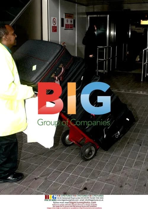 Simon Cowell departs Heathrow with family