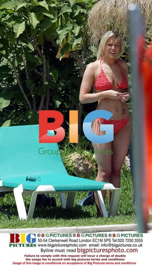 Suzanne Shaw Relaxes by Pool