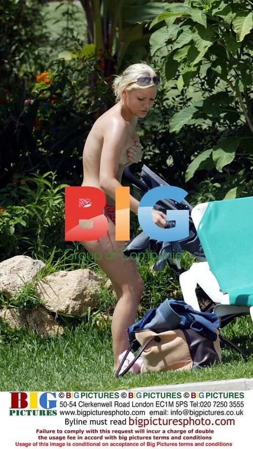 Suzanne Shaw Relaxes by Pool