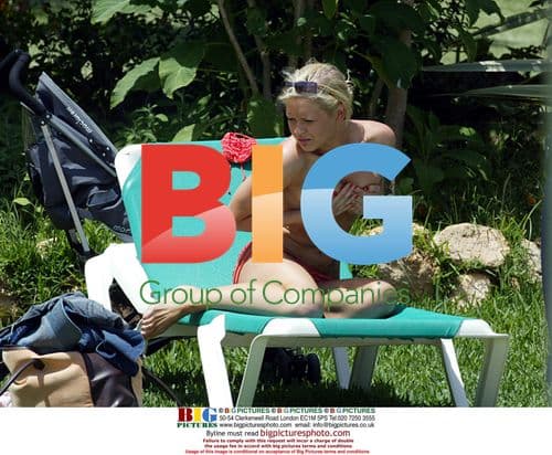 Singer Suzanne Shaw sunbathes in Grand Canaries