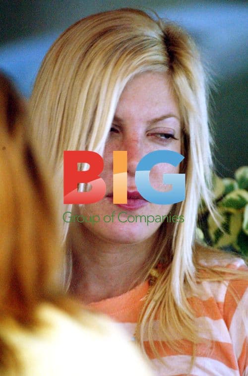 Tori Spelling looks upset after split