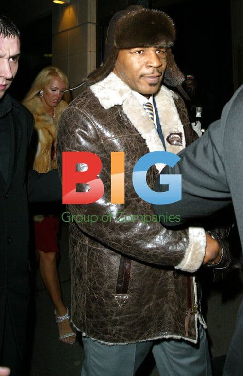 Mike Tyson Leaving Nightclub with Mystery Girl