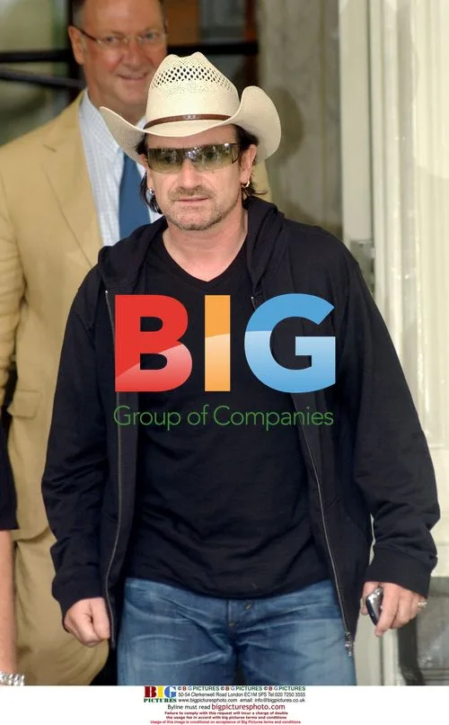 U2 Leaves Amstel Hotel for Vertigo Tour