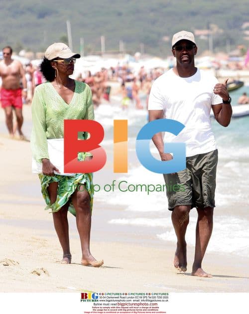 Denzel Washington and wife on beach