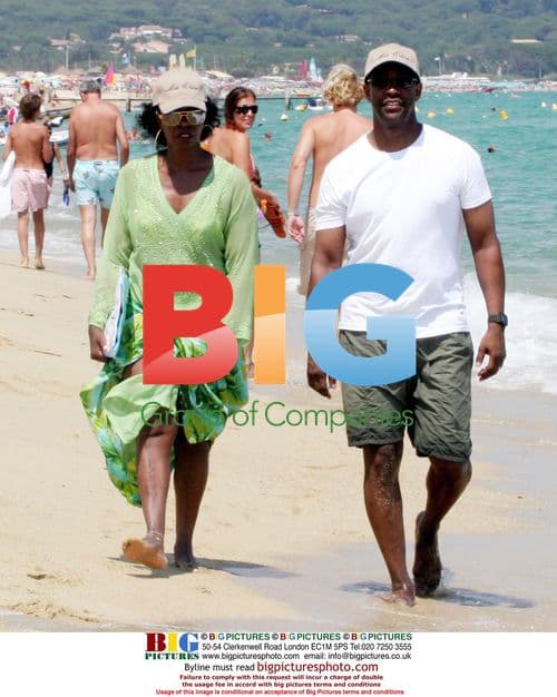 Denzel Washington and wife on beach
