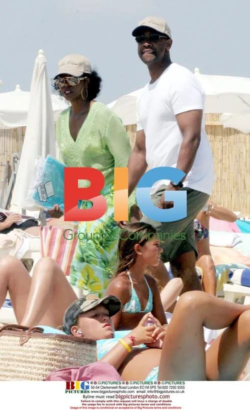 Denzel Washington and wife on beach in Saint Tropez
