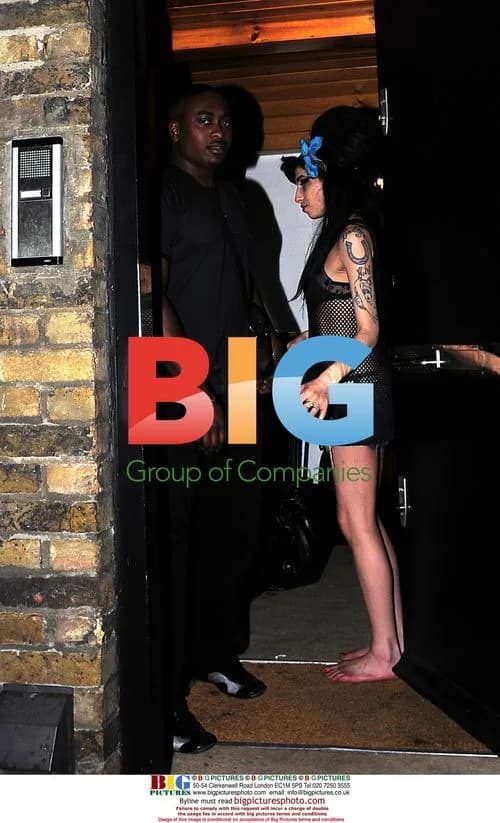 Amy Winehouse seeing off friend in London