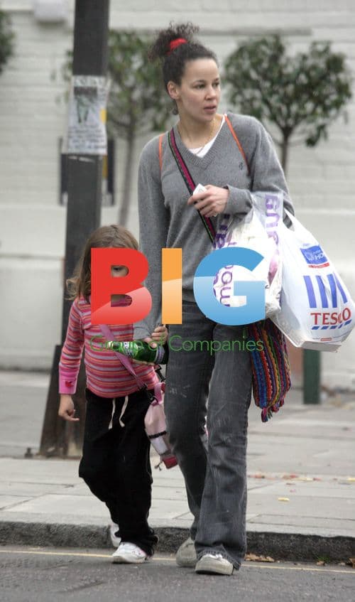 Damon Albarn's Family Shopping in West London