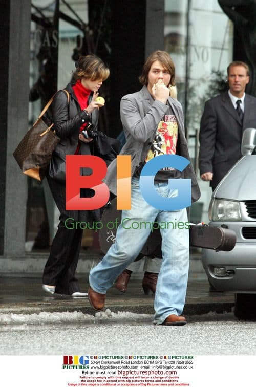 Brian McFadden and Delta Goodrem leave hotel