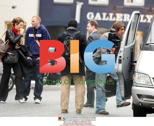 Brian McFadden and Delta Goodrem Leaving Hotel