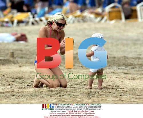 Model Caprice relaxes on Gran Canaria