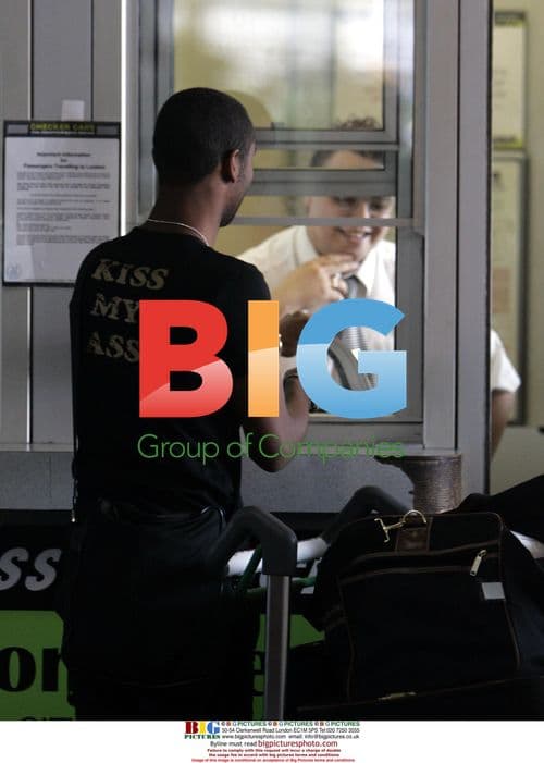 Ashley Cole and Cheryl Tweedy at London Airport