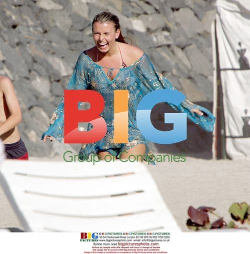 Coleen McLoughlin relaxes on holiday