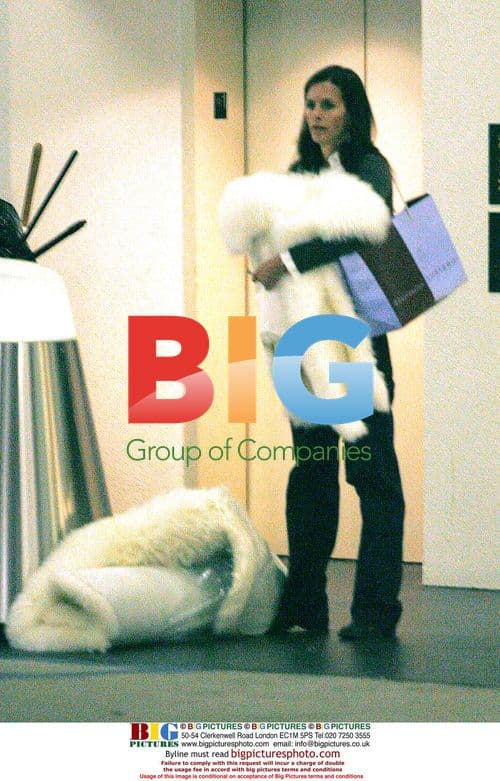 David Arquette waits for Courtney Cox-Arquette