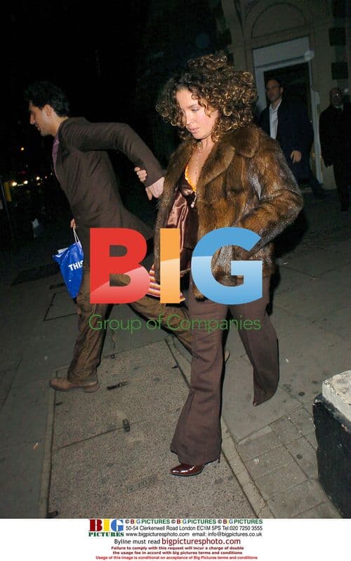 Singer Darius and mystery woman leave London bar