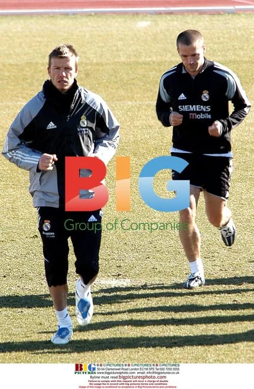 David Beckham laughs with Real Madrid team
