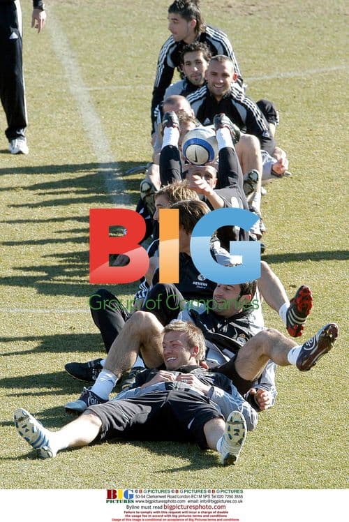 David Beckham laughs with Real Madrid team