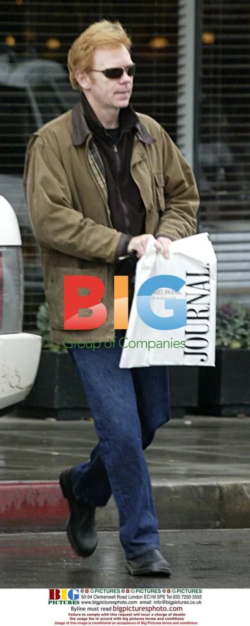 David Caruso Reads Newspaper at Newsstand