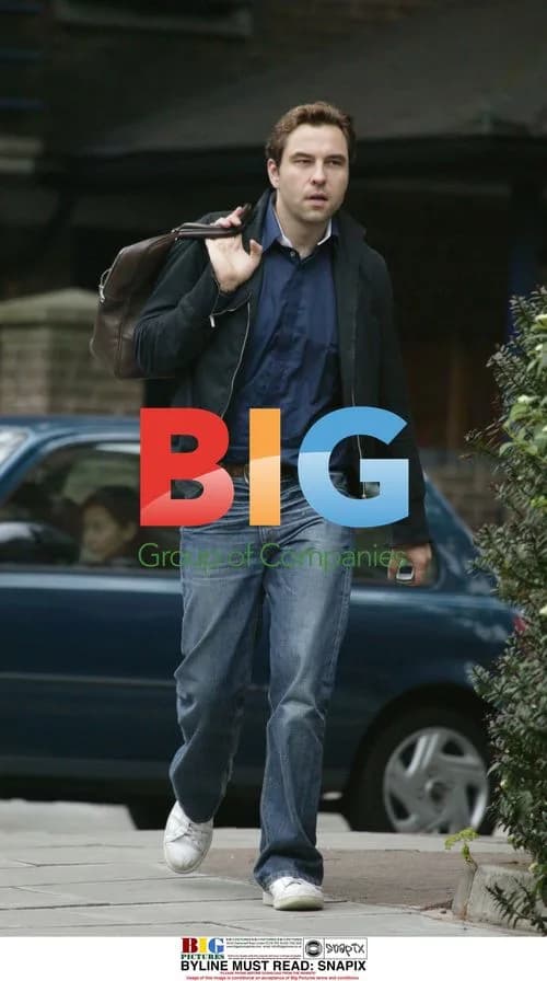 David Walliams at cash machine in London