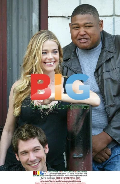 Denise Richards Gets Cozy with Mystery Man