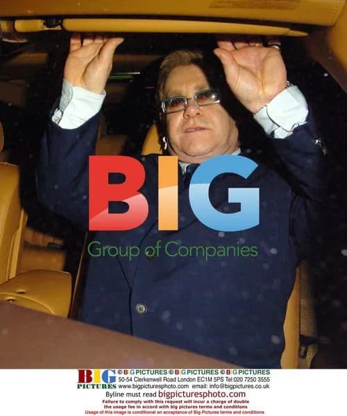 Elton John at 4 Inches Charity Auction