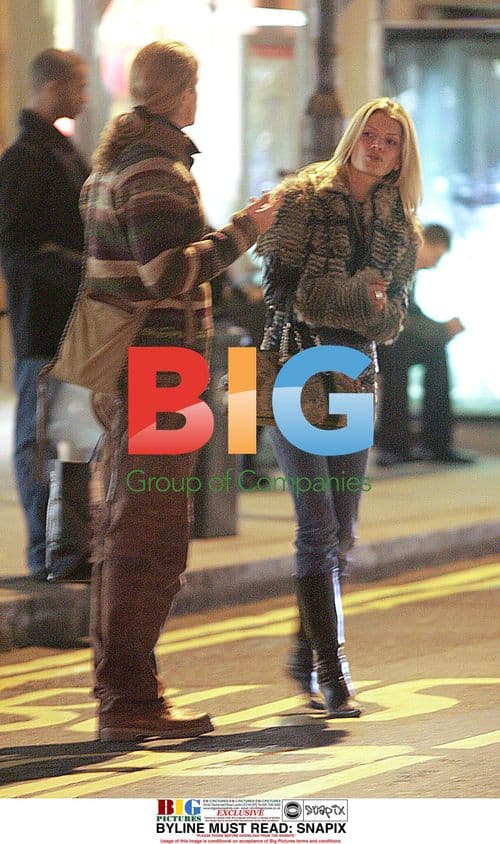 Emmanuel Petit and girlfriend shopping in London