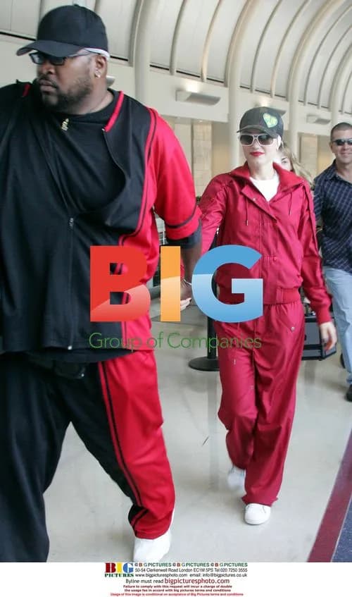 Gwen Stefani with Bodyguard at LAX