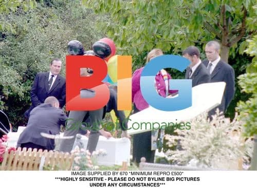 Wraggs at son's funeral