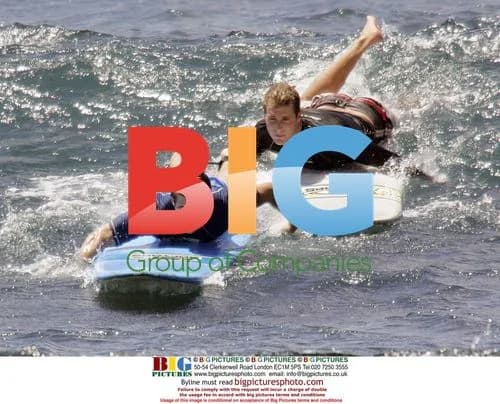Jake Gyllenhall surfs in Maui, Hawaii