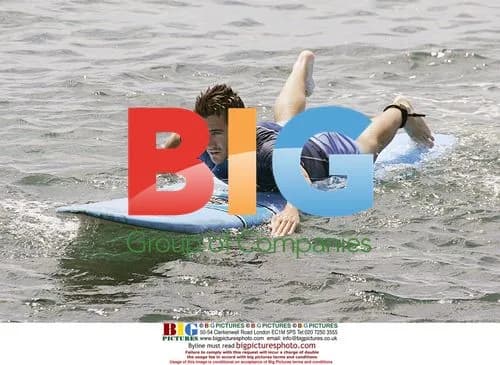 Jake Gyllenhall Surfs in Maui