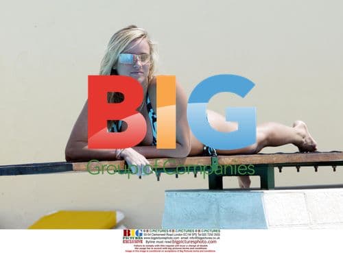 Aussie model Jade Hounsell and actress Jamie Lewis on Portugal beach