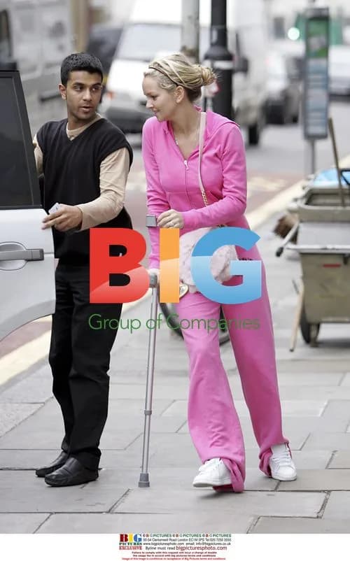 Jennifer Ellison Assisted with Bags in London