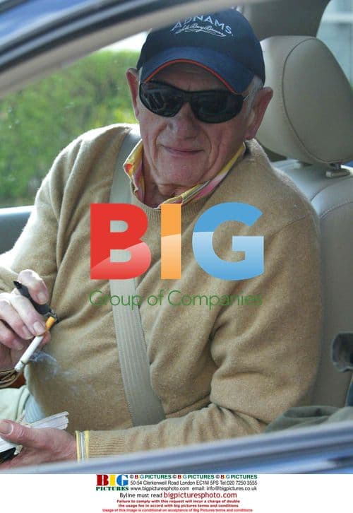 Actor John Bardon signing autograph for fan