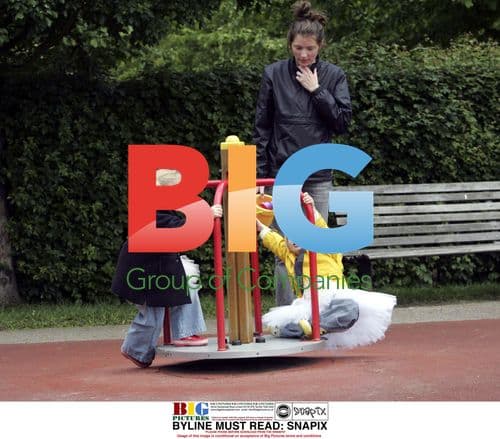 Jools Oliver with daughters in London park