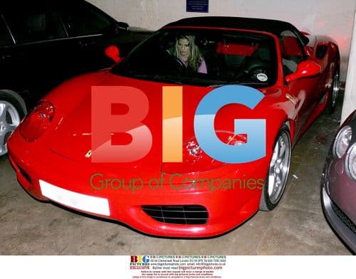 Model Jordan Tests New Red Ferrari