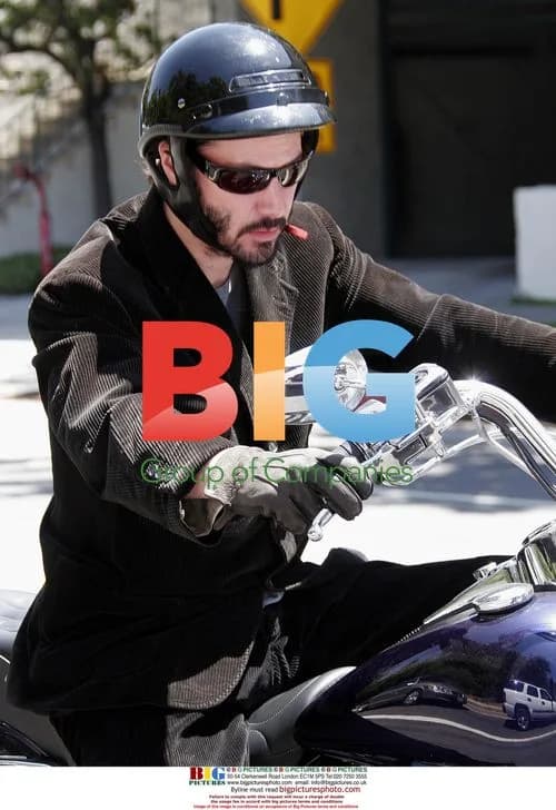 Keanu Reeves Spits at Photographer