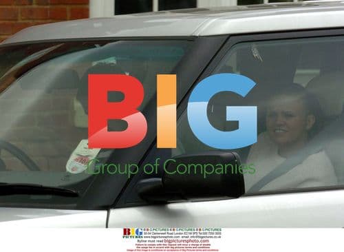 Kerry Katona returns home with boyfriend