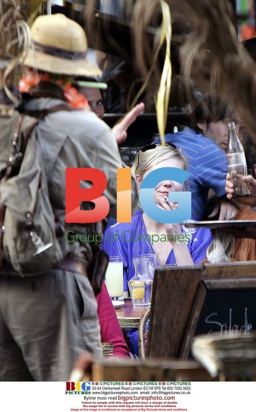 Kristen Dunst in Paris Cafe