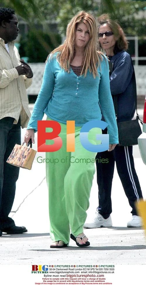 Kirstie Alley in unflattering lime green pants