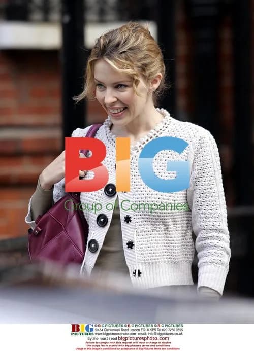 Kylie Minogue Smiles Heading to Rehearsals