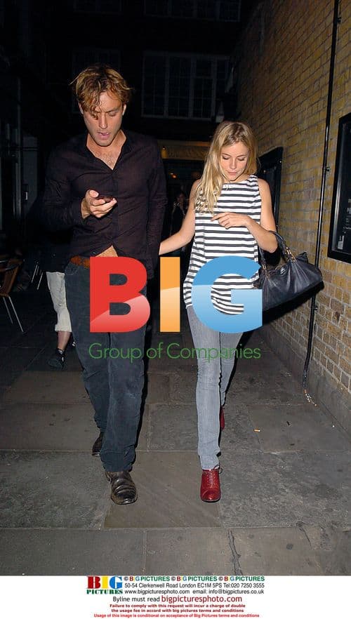 Jude Law and Sienna Miller Leaving the Wyndhams Theatre