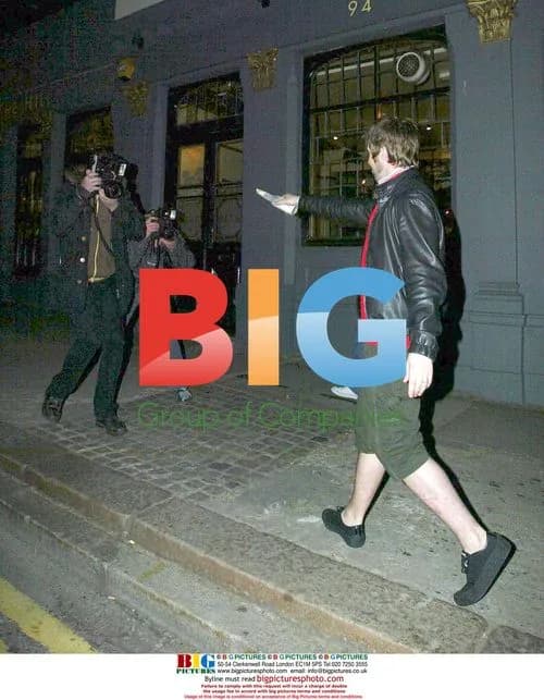 Oasis' Liam Gallagher throws beer on paparazzi