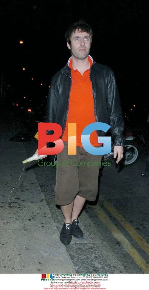 Liam Gallagher Showers Paparazzi with Beer