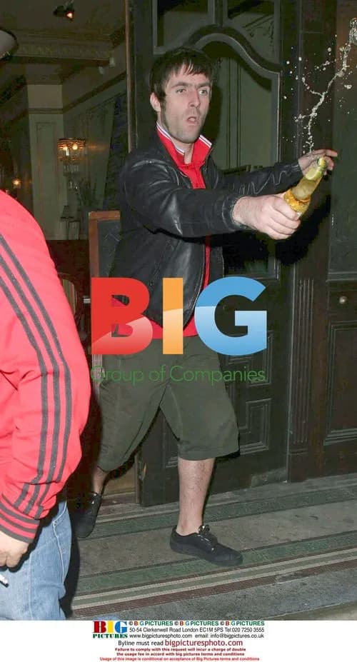 Liam Gallagher showers paparazzi with beer