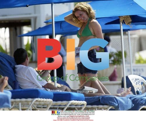 Gabby Logan and Alan Hansen chatting on Barbados beach