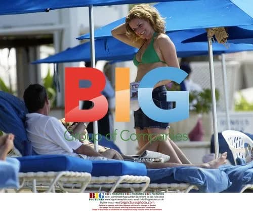 Gabby Logan and Alan Hansen chatting on Barbados beach