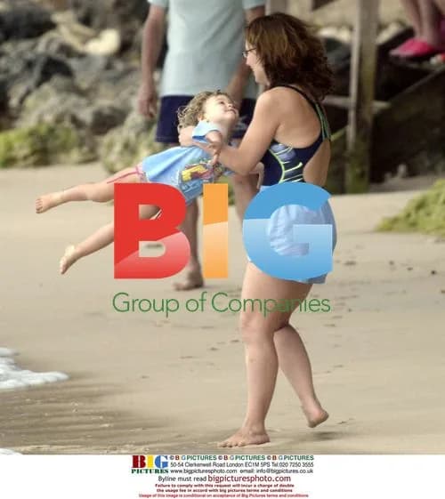 Pavarotti relaxes with family on beach